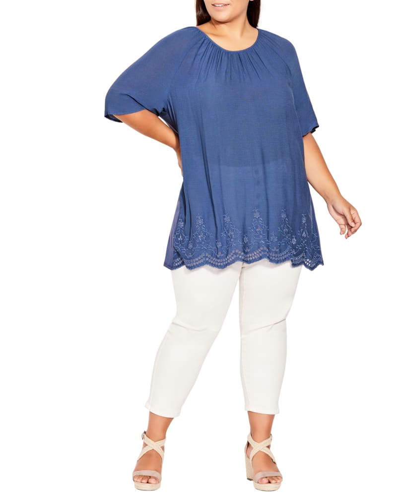 Front of a model wearing a size 14 Payton Embroidered Top in Azure Blue by avenue. | dia_product_style_image_id:214129